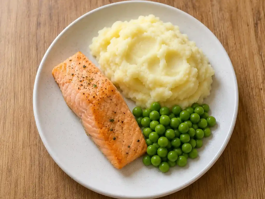 Toddler Dinner Ideas: 50+ Easy, Healthy Meals the Whole Family Will Love 5 baked salmon with creamy mashed potato
and soft steamed peas