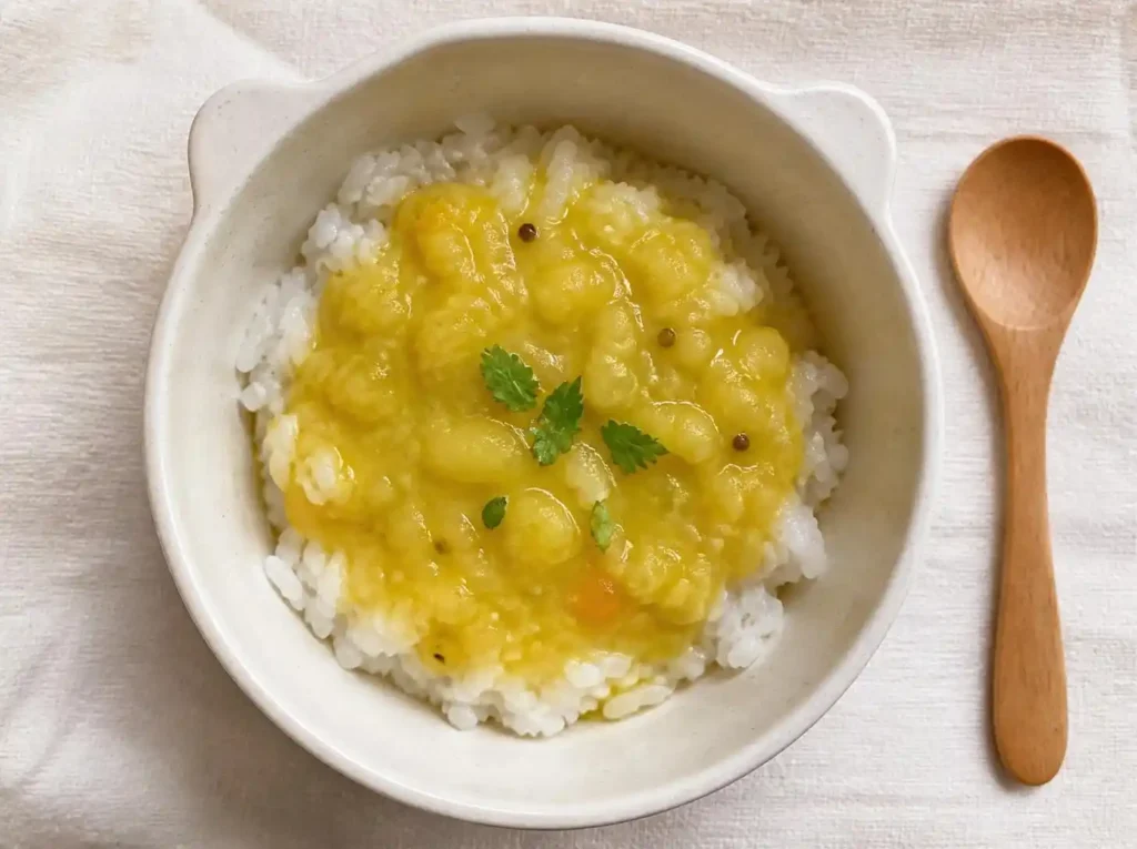 Toddler Dinner Ideas: 50+ Easy, Healthy Meals the Whole Family Will Love 2 dal chawal in small toddler bowl,
yellow lentil soup over white rice