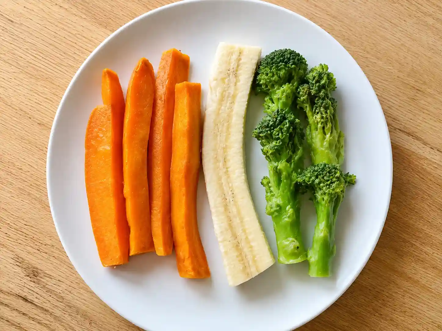 Finger Foods for 1 Year Old: 50+ Safe, Easy & Nutritious Ideas 7 long strips of soft sweet potato, banana strip and steamed broccoli spear